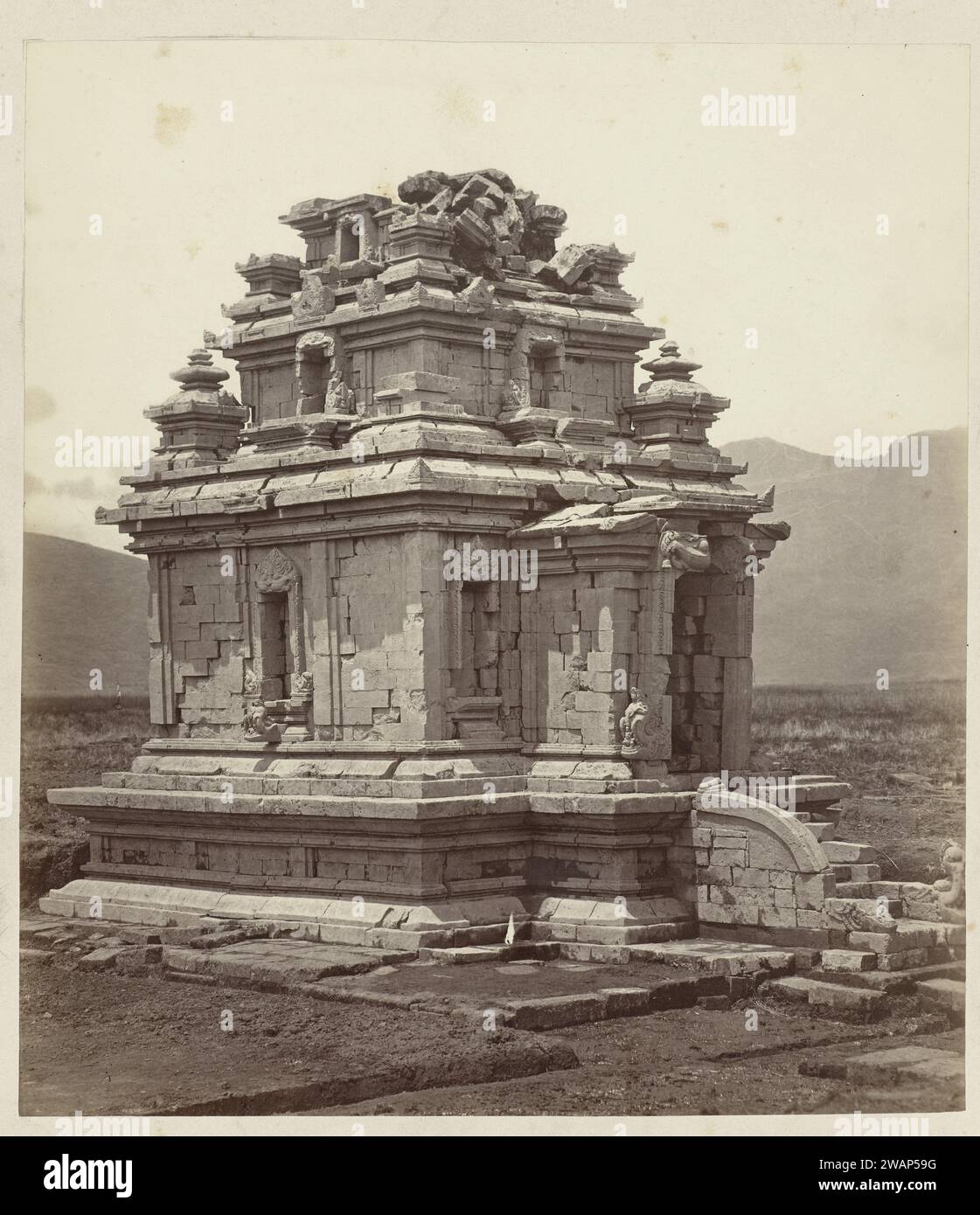Candi Arjuna, general view showing the staicase projection and the entrance (west). Dieng plateau, Wonosobo district, Central Java province, 8th-9th century., 1864 photograph  Java (possibly) paper. photographic support. cardboard albumen print Stock Photo