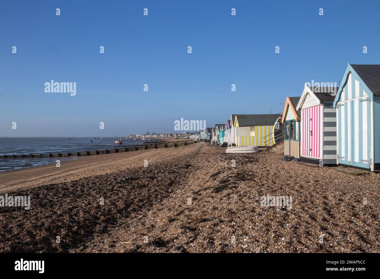 Boats and beach huts on Thorpe Bay beach, SouthendonSea, Essex