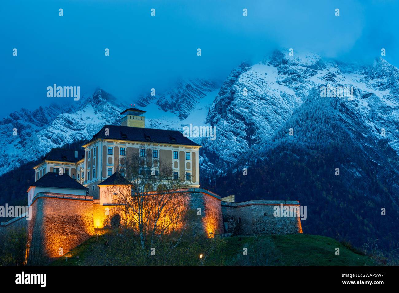Stainach-Pürgg: Schloss Trautenfels Castle, snow covered mountain Grimming in Schladming-Dachstein, Steiermark, Styria, Austria Stock Photo