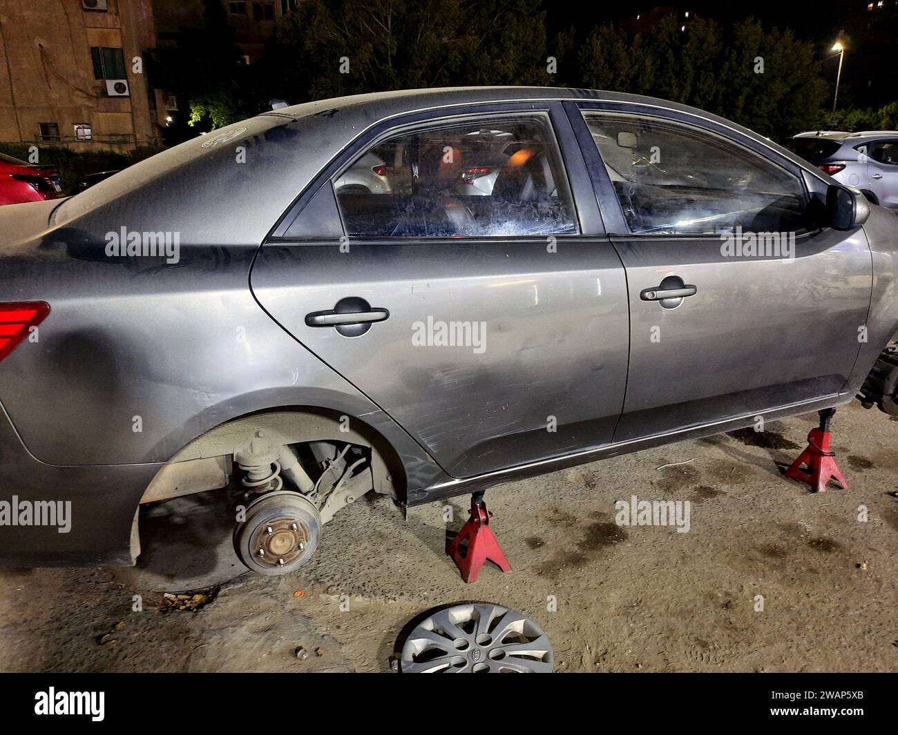 Cairo, Egypt, September 26 2023 maintenance of a KIA Cerato Korean car