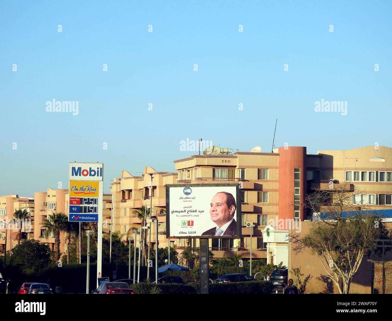 Cairo, Egypt, December 15 2023: Egyptian presidential election campaign banners, Egypt's president election 2024 advertisement near Cairo monorail sit Stock Photo