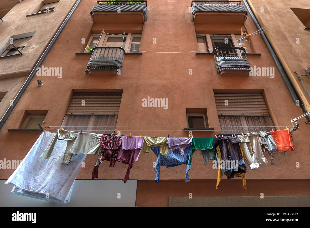 Laundry on the line at a residential tower block, Genoa, Italy, Europe ...