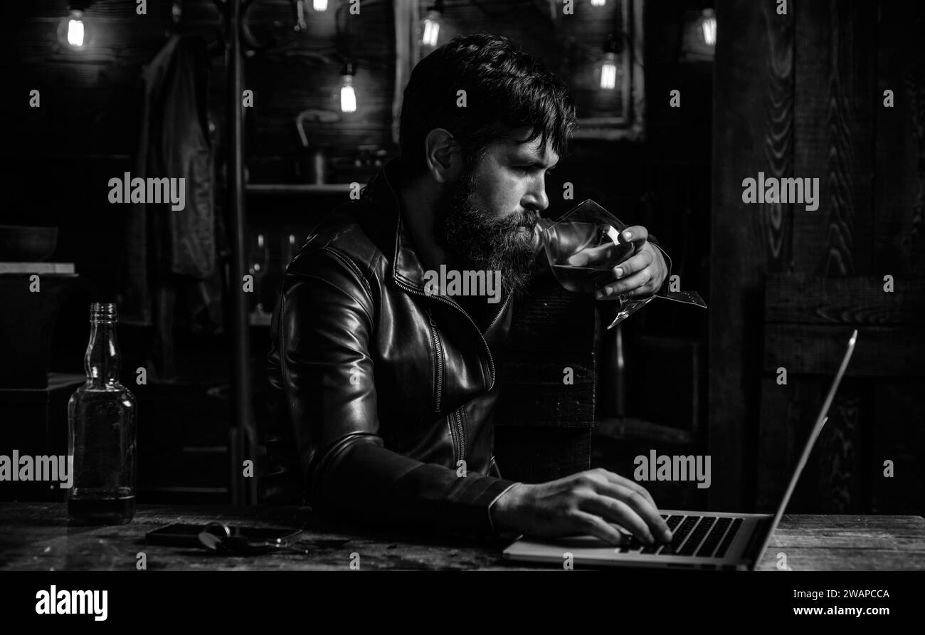 Portrait of a handsome man with beard. Brutality and masculine concept. Man with beard, biker in leather jacket. Portrait of stylish man beard Stock Photo