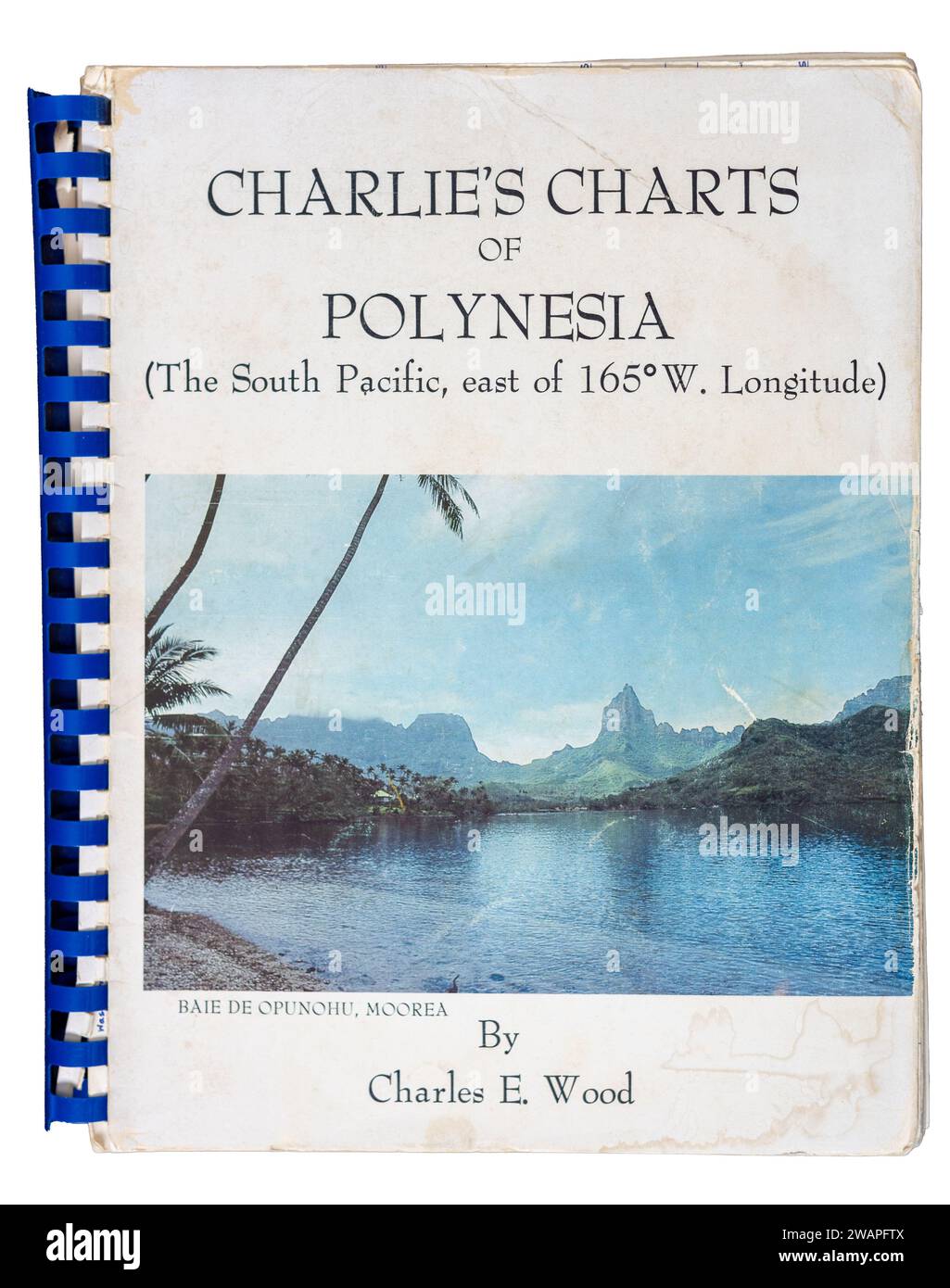 Well used copy of Charlie's Charts of Polynesia, a book with navigation charts and sailing directions for sailors cruising in the South Pacific. Stock Photo