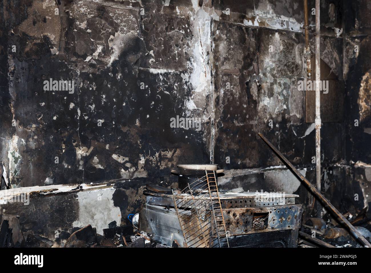 The kitchen of one of the flats is seen after a fire caused by a missile attack on a peaceful flat block Stock Photo