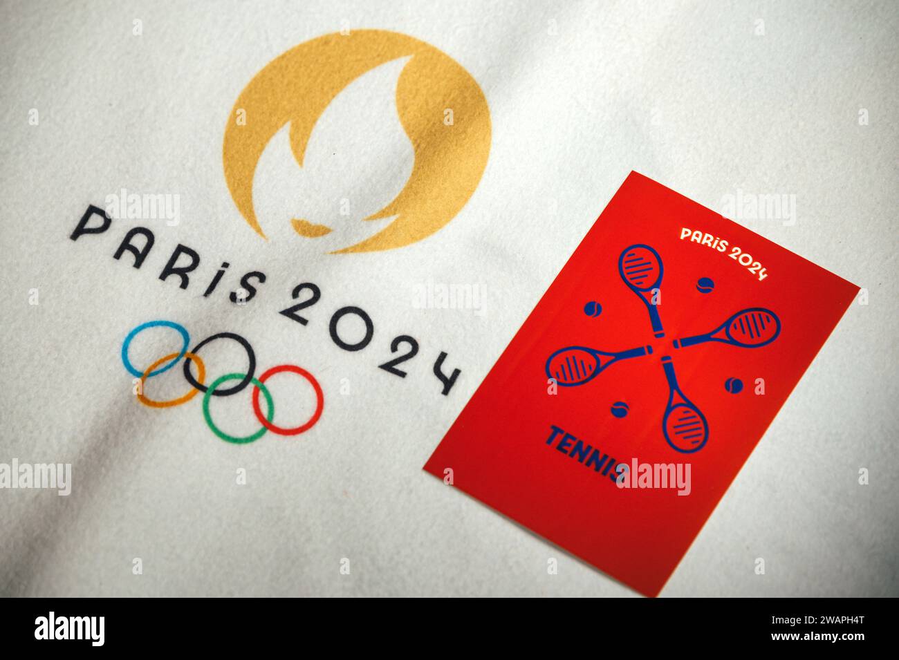 PARIS, FRANCE, JANUARY 4. 2024 Tennis pictogram for Paris 24 Games on white blanket with