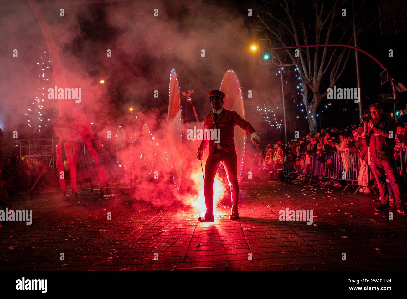 Madrid, Spain. 05th Jan, 2024. An extra walks with a lit sparkler during the celebration of the