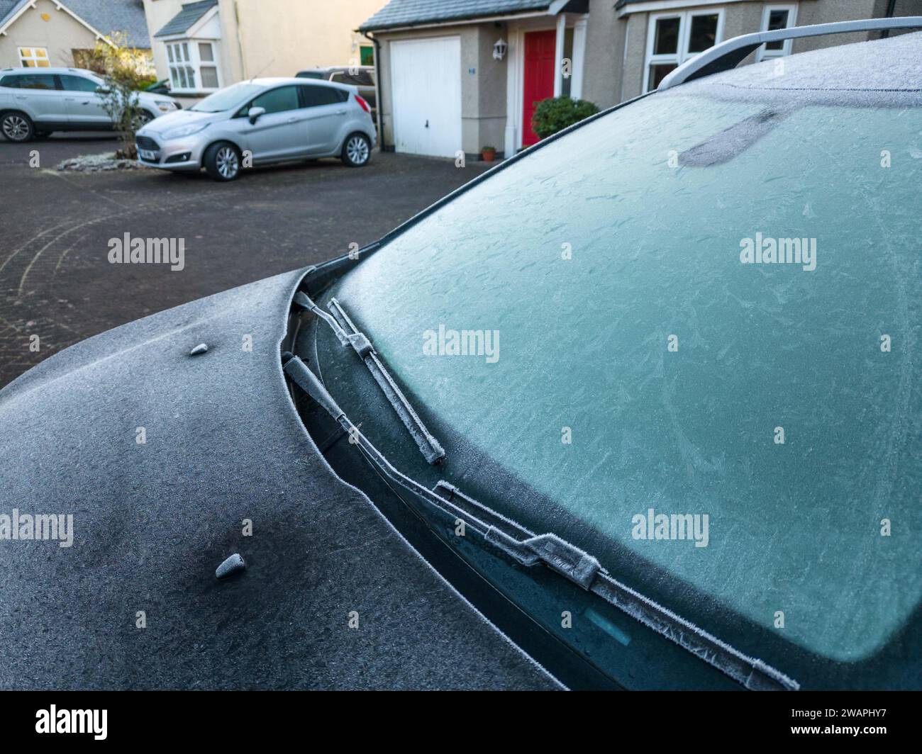 Kendal, Cumbria, January 6th 2024 - A clear night and sub-zero temperatures brought a cold morning frost to the town of Kendal in Cumbria overnight. Vehicles were seen with iced windscreens and the local Kendal Ski Slope had a frosty layer after the freezing conditions. Credit: Stop Press Media/Alamy Live News Stock Photo