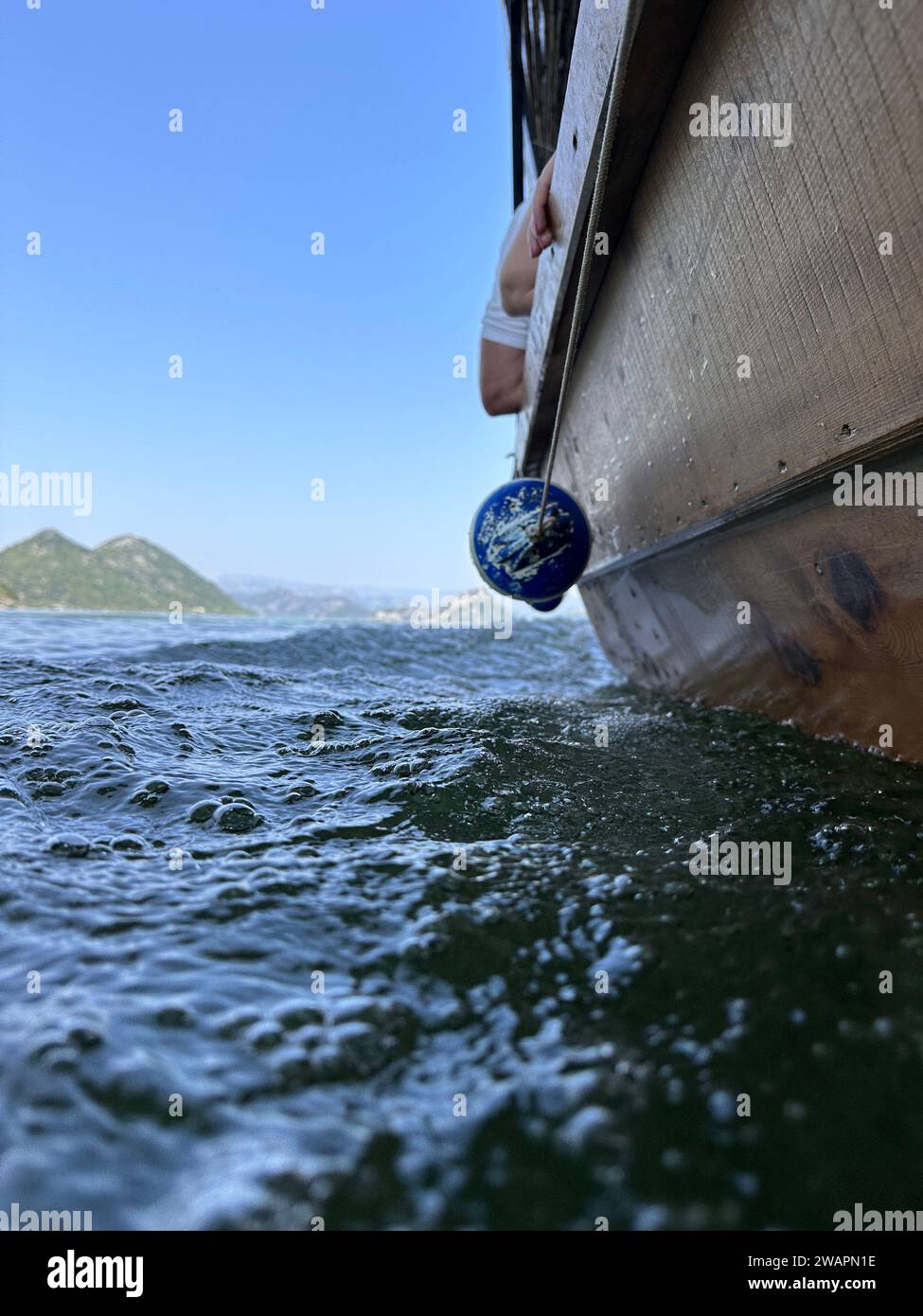 A close-up of the bow of a ship sailing in calm waters Stock Photo