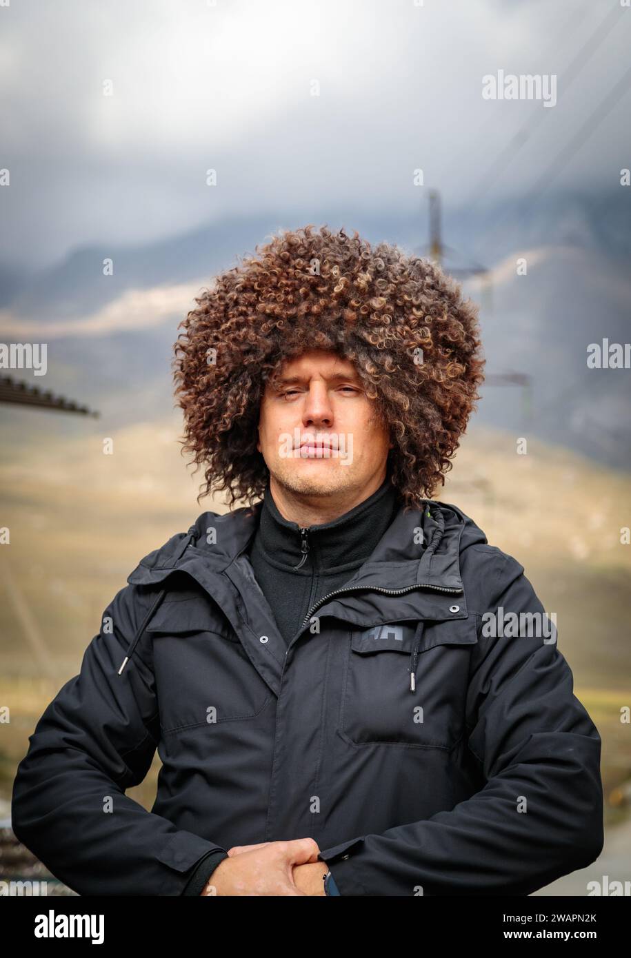 Ossetian man in a national fur hat, expressing pride in his national traditions and culture Stock Photo