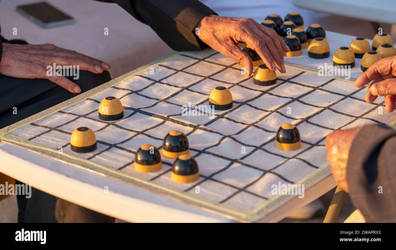 al damam board game-a traditional arabic game Stock Photo - Alamy