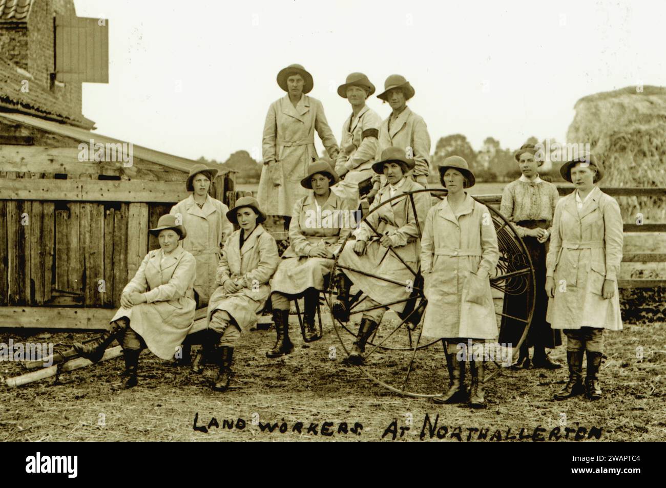 Print from a postcard of Landworkerrs at Northallerton, same lady in photo as training officer maybe, second on right Stock Photo