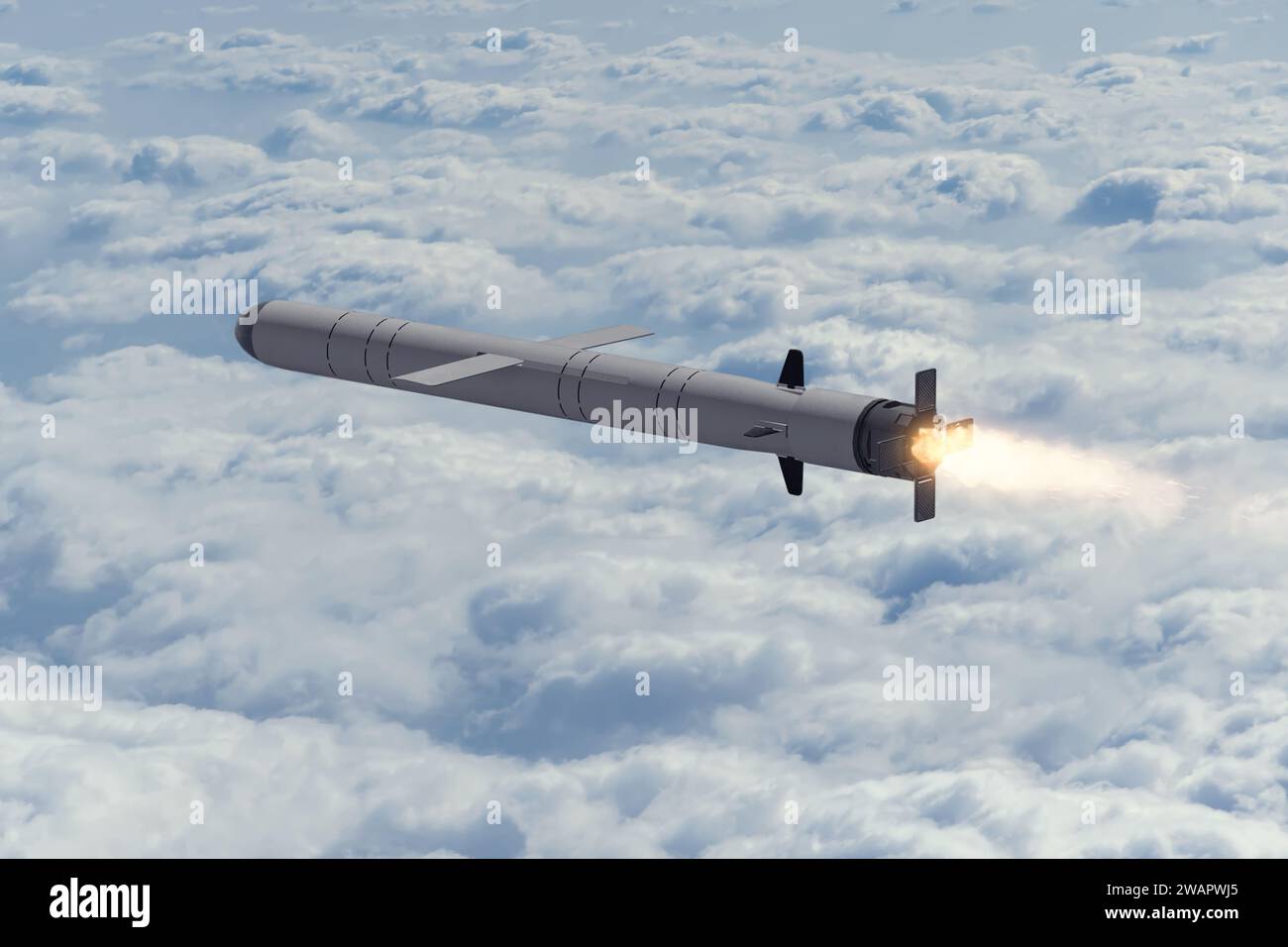Russian cruise missile "Kalibr" flies above the clouds, smoke and fire from the nozzle of the missile. Concept: war in Ukraine, Russian missile attack Stock Photo