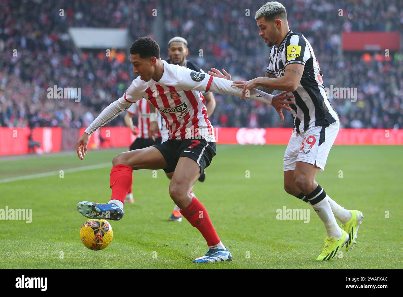 Sunderland on Saturday 6th January 2024. Sunderland's Jobe Bellingham holds off Newcastle United's Bruno Guimarães during the FA Cup Third Round match between Sunderland and Newcastle United at the Stadium Of Light, Sunderland on Saturday 6th January 2024. (Photo: Michael Driver | MI News) Credit: MI News & Sport /Alamy Live News Stock Photo