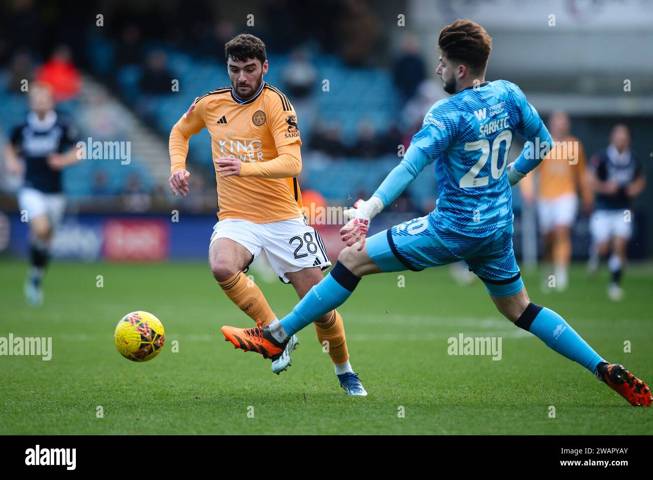 LONDON, UK - 6th Jan 2024:  Thomas Cannon of Leicester City rounds Matija Sarkic of Millwall to score his side's third goal during the FA Cup third round tie between Millwall FC and Leicester City FC at The Den  (Credit: Craig Mercer/ Alamy Live News) Stock Photo