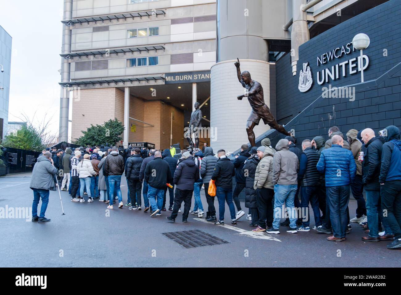 Newcastle upon Tyne, UK. 6th January 2024. Newcastle United fans in the queue for the busses to take them to the away match in Sunderland, in the Wear-Tyne derby FA Cup 3rd Round. Credit: Hazel Plater/Alamy Live News Stock Photo