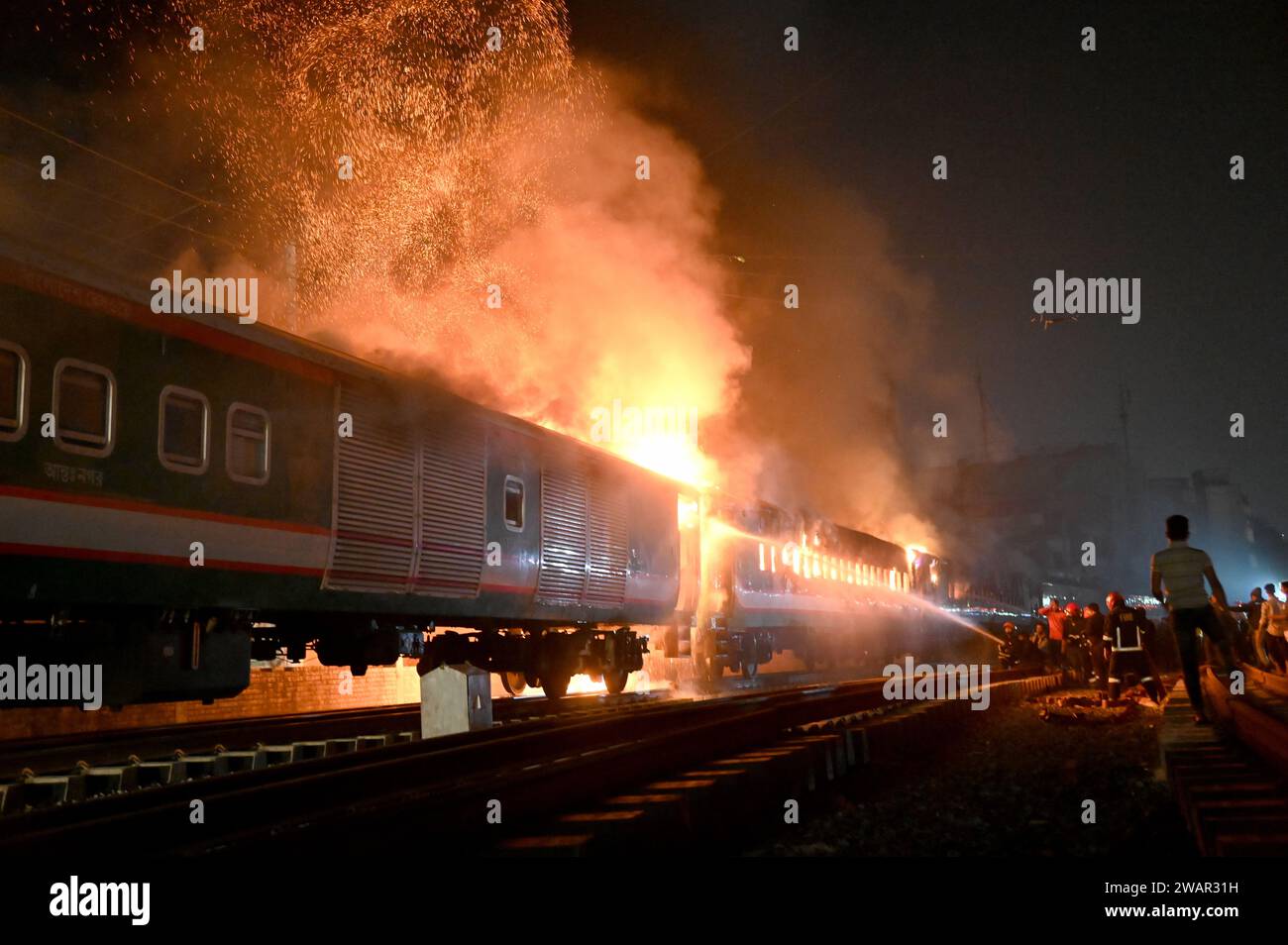 Dhaka, Bangladesh - January 05, 2024: At least four people were killed in an arson attack on Benapole Express train at Gopibagh during the train’s ent Stock Photo