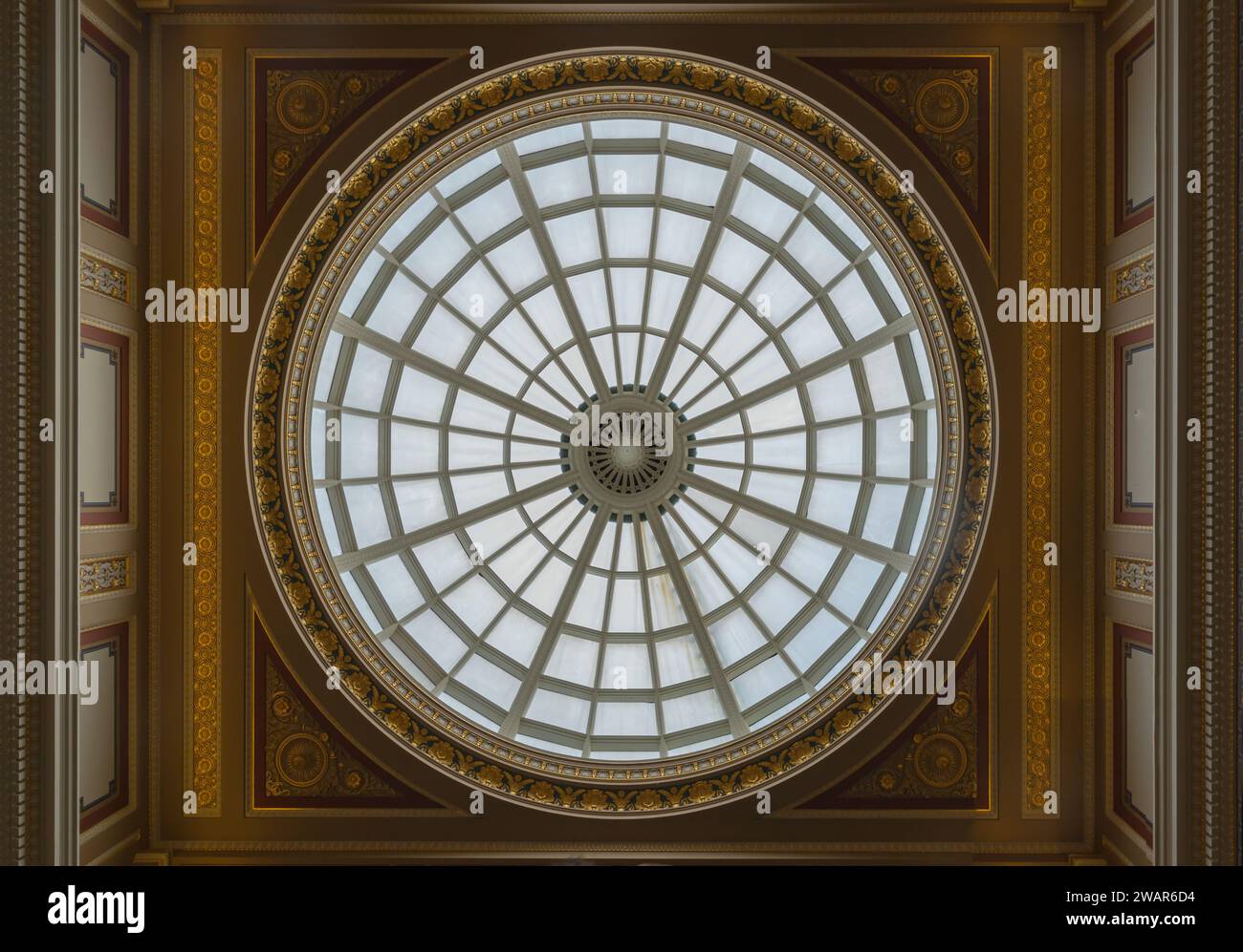 London, UK - Oct 31, 2023 - Light passes through The high ceiling glass dome inside main hall of The National Gallery. Ceiling dome architecture desig Stock Photo