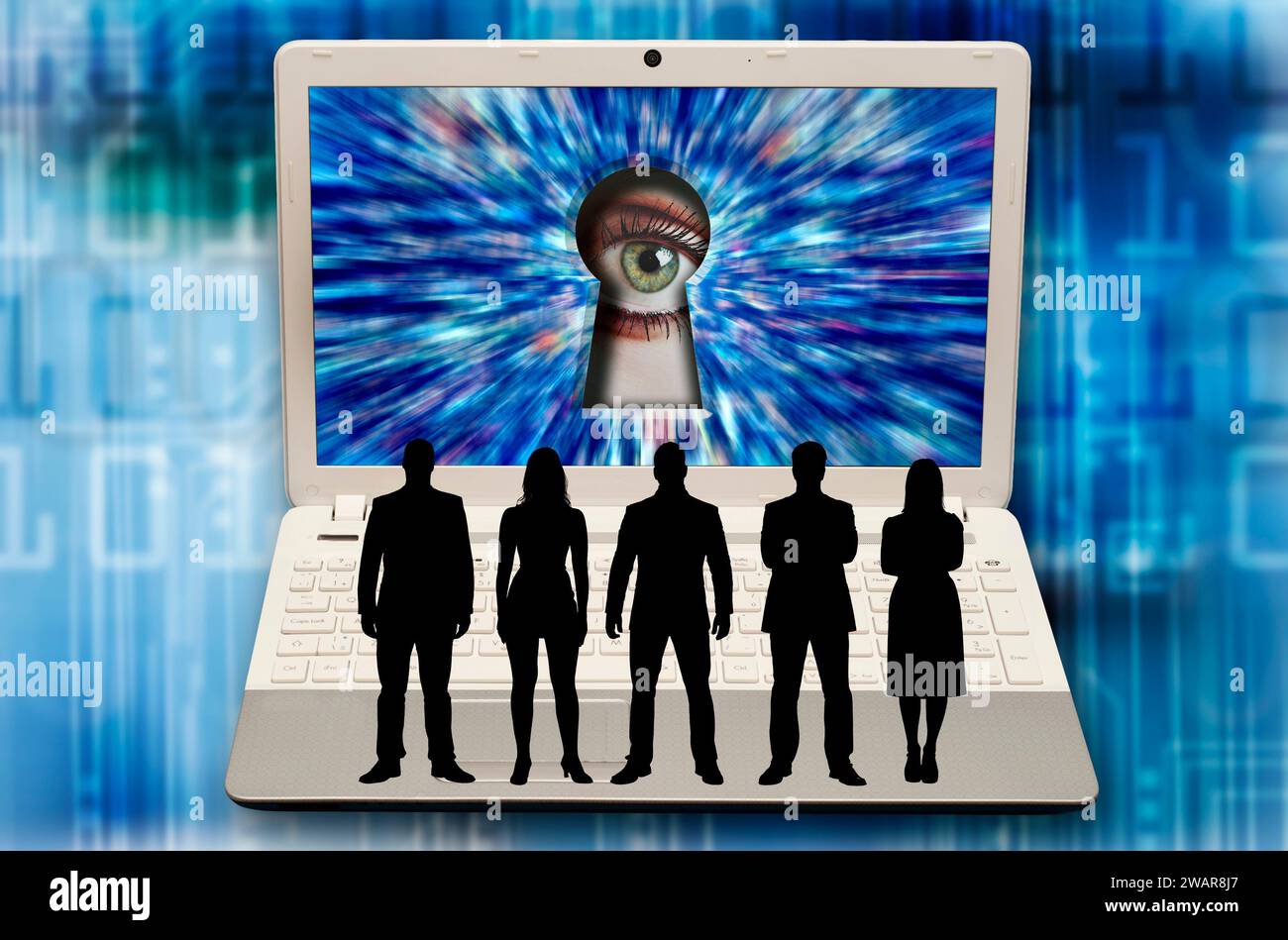 people silhouette on a laptop and a big brother eye looking at them from the screen Stock Photo