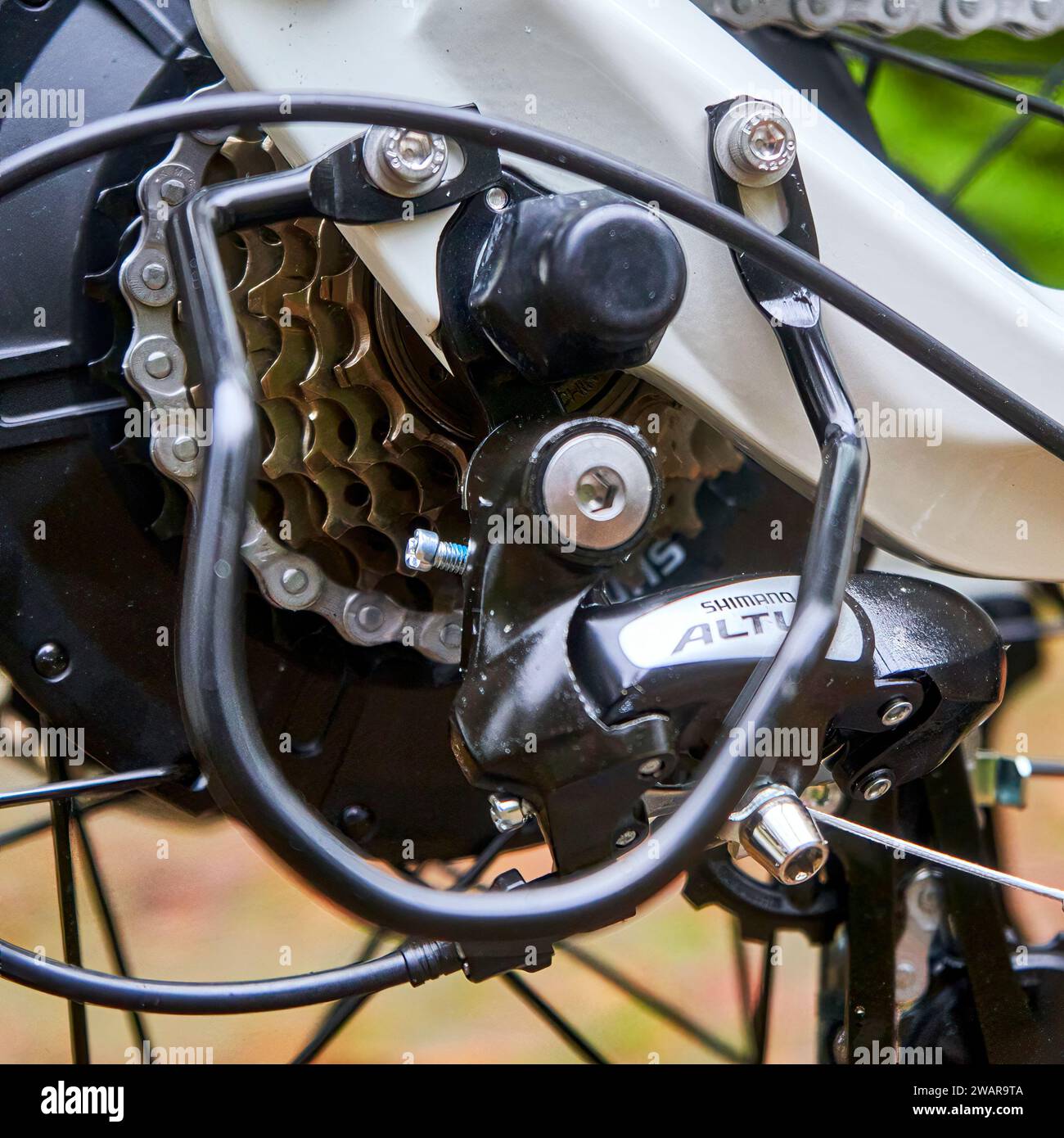 Shimano Altus Rear Derailleur and Cassette on the Drive Wheel of an Electric E-Bike in Gifhorn, Germany, January 6, 2024 Stock Photo