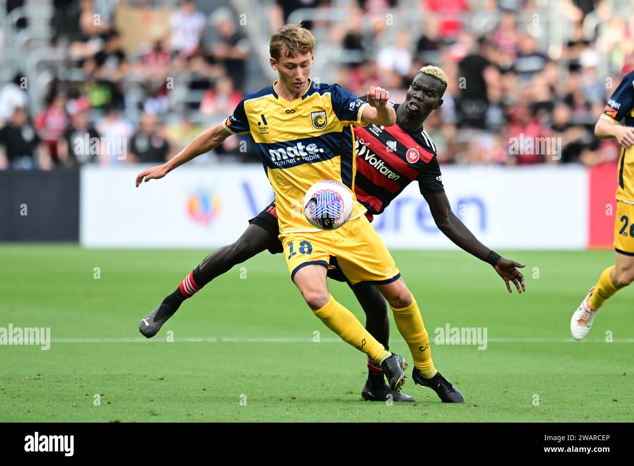 Parramatta, Australia. 06th Jan, 2024. Jacob Brett Farrell (L) of the Central Coast Mariners and Valentino Kuach Yuel (R) of the Western Sydney Wanderers FC seen in action during the 2023-24 A-League Men's season round 11 match between Western Sydney Wanderers FC and Central Coast Mariners at CommBank Stadium. Final score; Central Coast Mariners 1: 0 Western Sydney Wanderers. (Photo by Luis Veniegra/SOPA Images/Sipa USA) Credit: Sipa USA/Alamy Live News Stock Photo