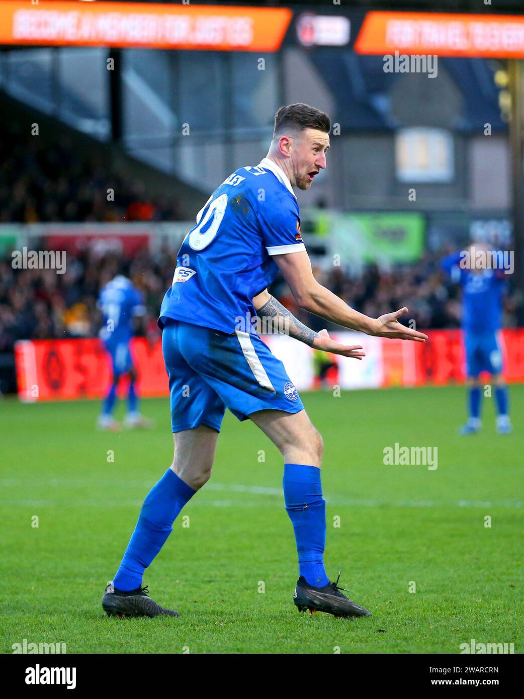 Eastleigh's Scott Quigley reacts after not being awarded a penalty