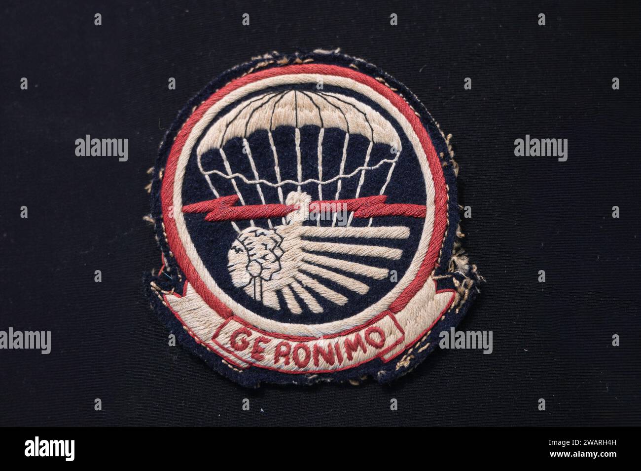 US WWII 501st Parachute Infantry Regiment Shoulder Patch - Geronimo on Black Background Stock Photo