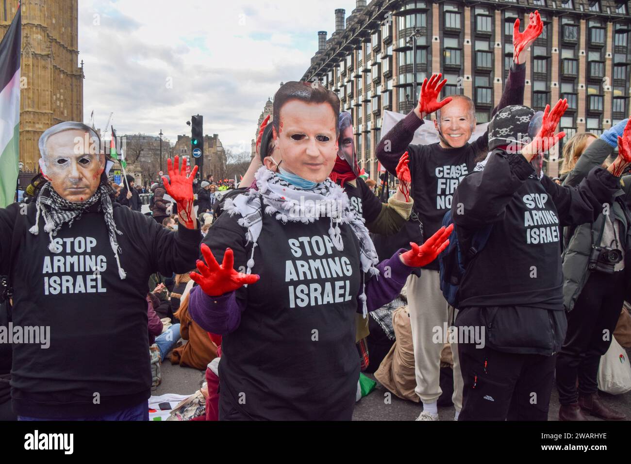 London, UK. 6th January 2024. Pro-Palestine protesters wear David ...