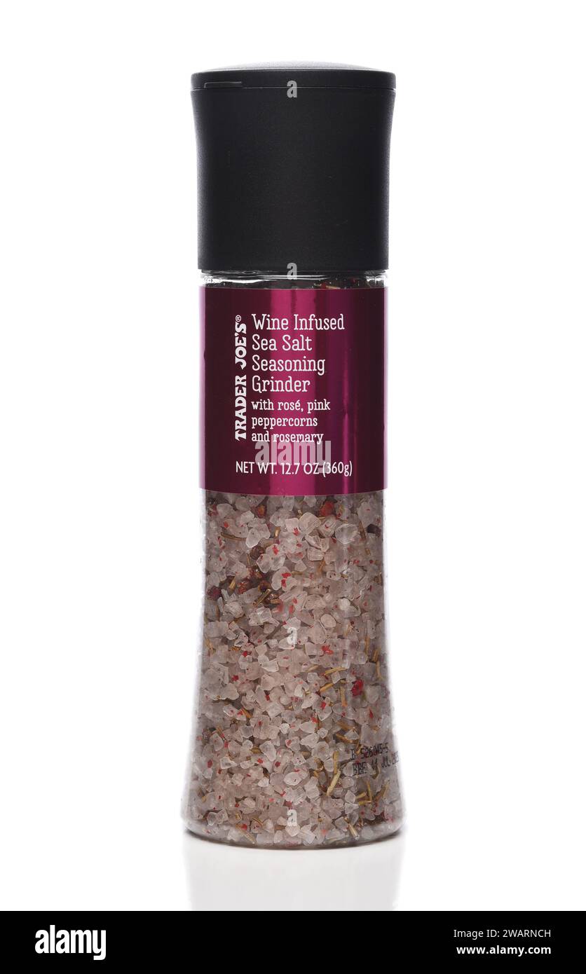 IRVINE, CALIFORNIA - 3 JAN 2024: A Wine Infused Sea Salt Seasoning Grinder with peppercorns and rosemary from Trader Joes. Stock Photo