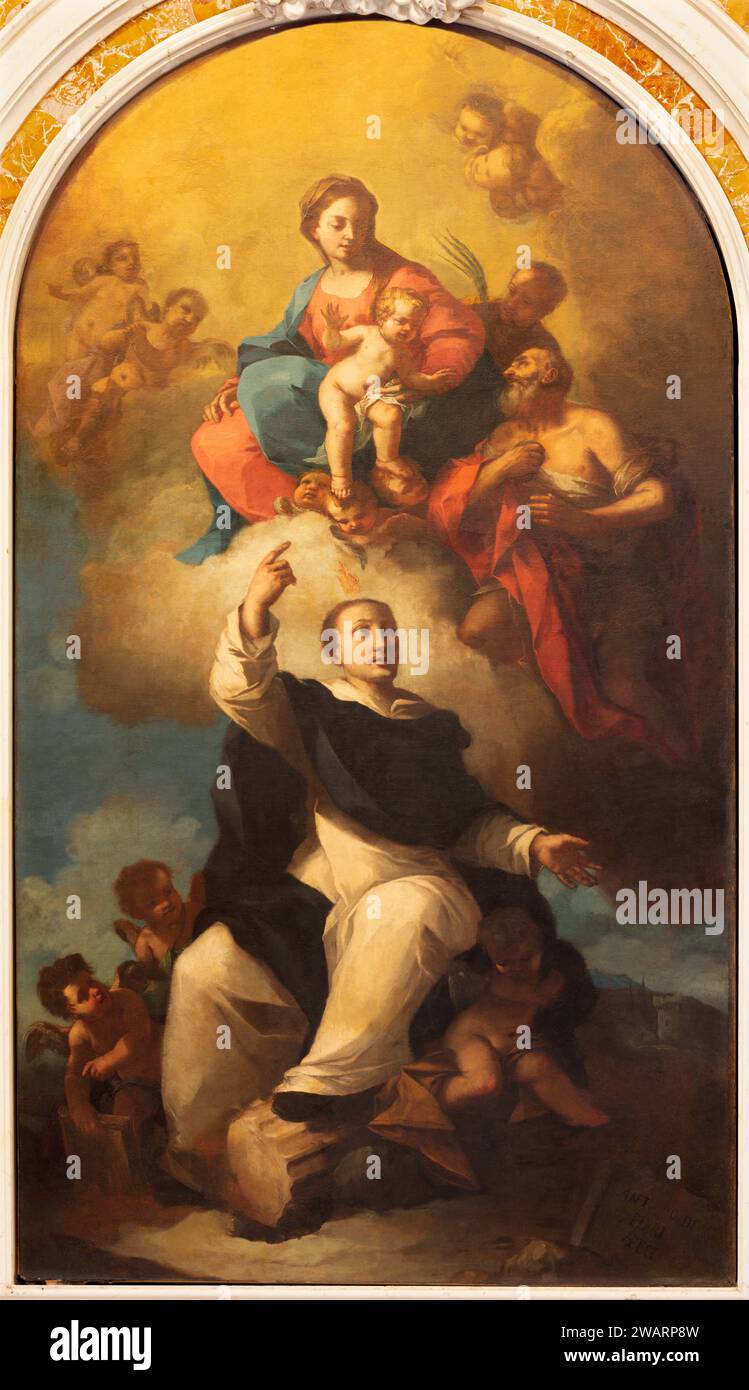 Vicenza - The baroque painting of Madonna, St. Vincente Ferrer and St. Jerome and St. Vincent martyr in the chruch Chiesa di Santa Corona Stock Photo