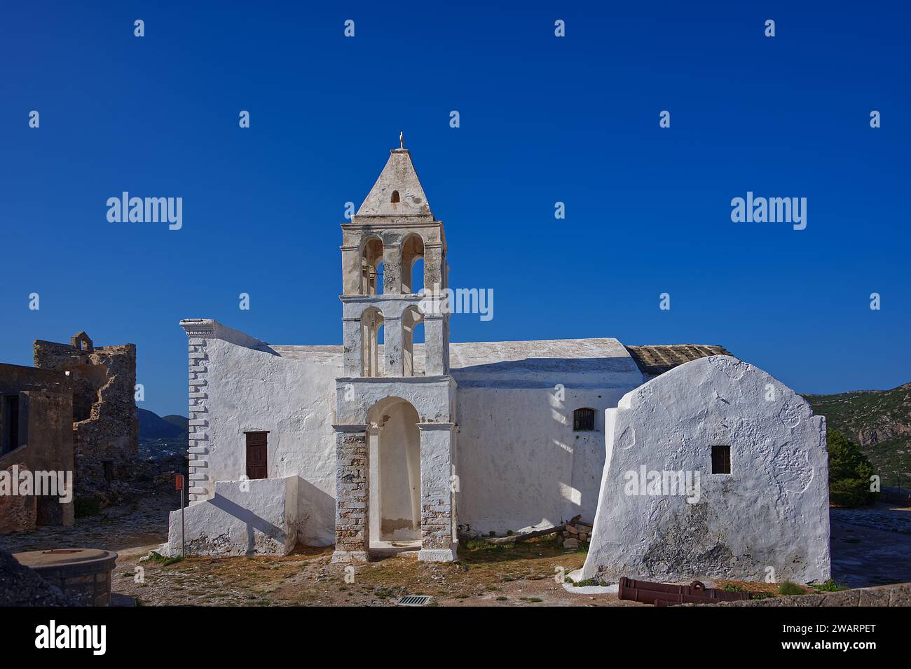 Greek orthodoxe white chapel on an picturesque greek island under the blue sky Stock Photo