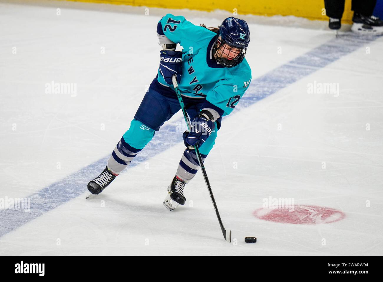 Bridgeport, CT, USA. 5th Jan, 2024. New York forward Chloé Aurard (12) controls the puck during a PWHL hockey game between Toronto and New York at Total Mortgage Arena in Bridgeport, CT. Rusty Jones/Cal Sport Media (Credit Image: © Rusty Jones/Cal Sport Media). Credit: csm/Alamy Live News Stock Photo