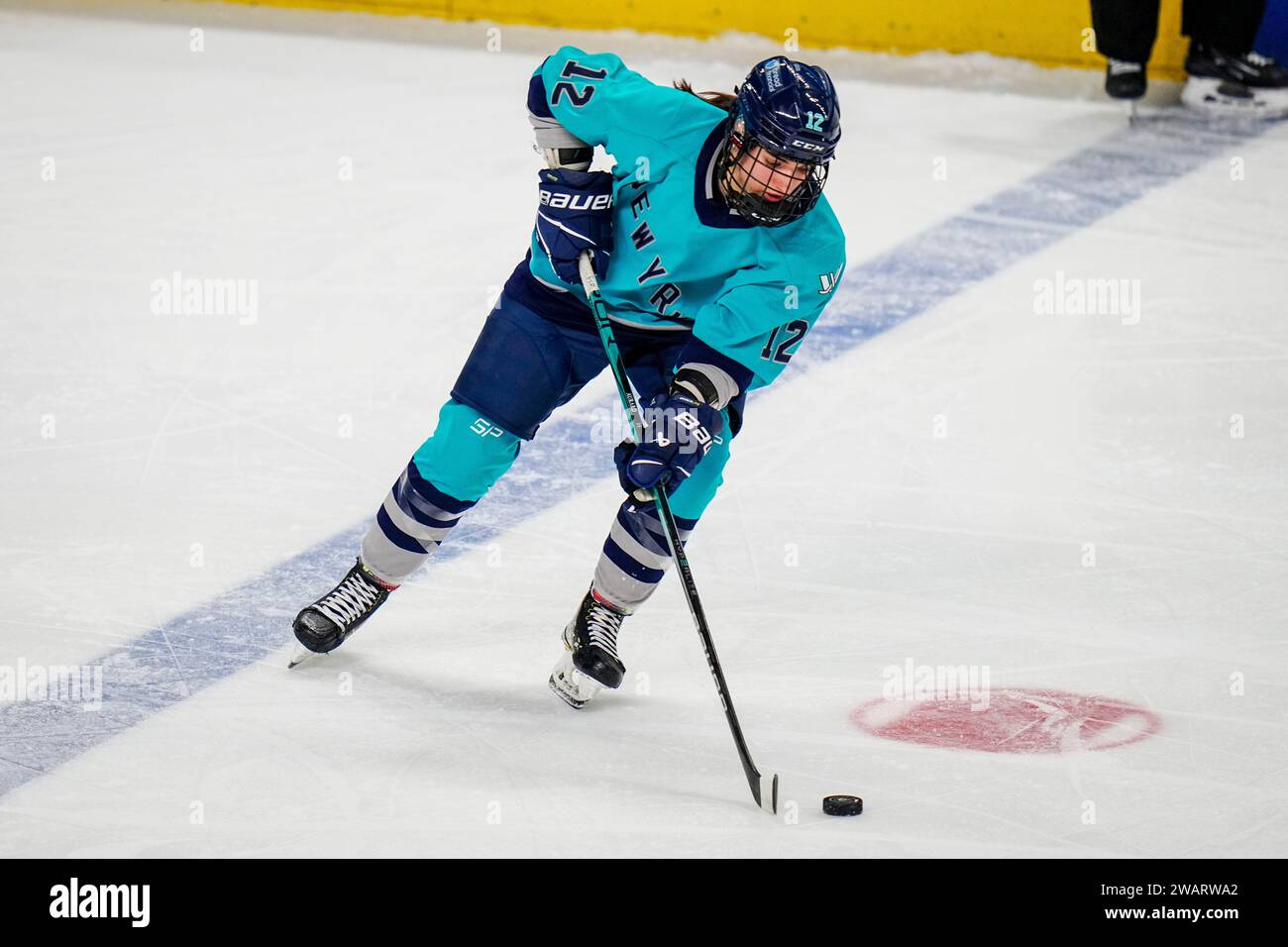 Bridgeport, CT, USA. 5th Jan, 2024. New York forward Chloé Aurard (12) controls the puck during a PWHL hockey game between Toronto and New York at Total Mortgage Arena in Bridgeport, CT. Rusty Jones/Cal Sport Media/Alamy Live News Stock Photo