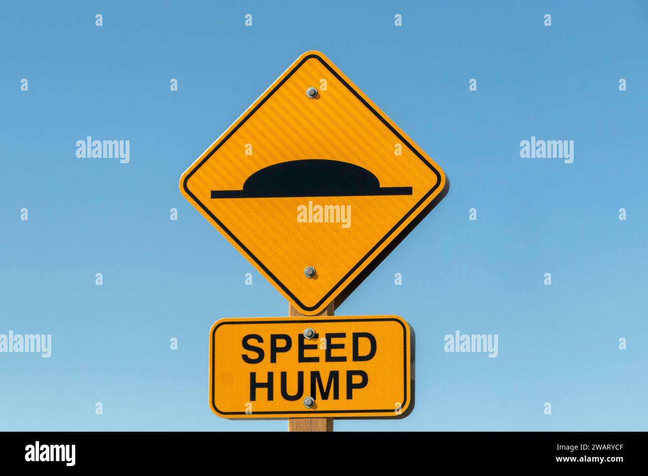 Speed hump ahead warning sign Stock Photo Alamy