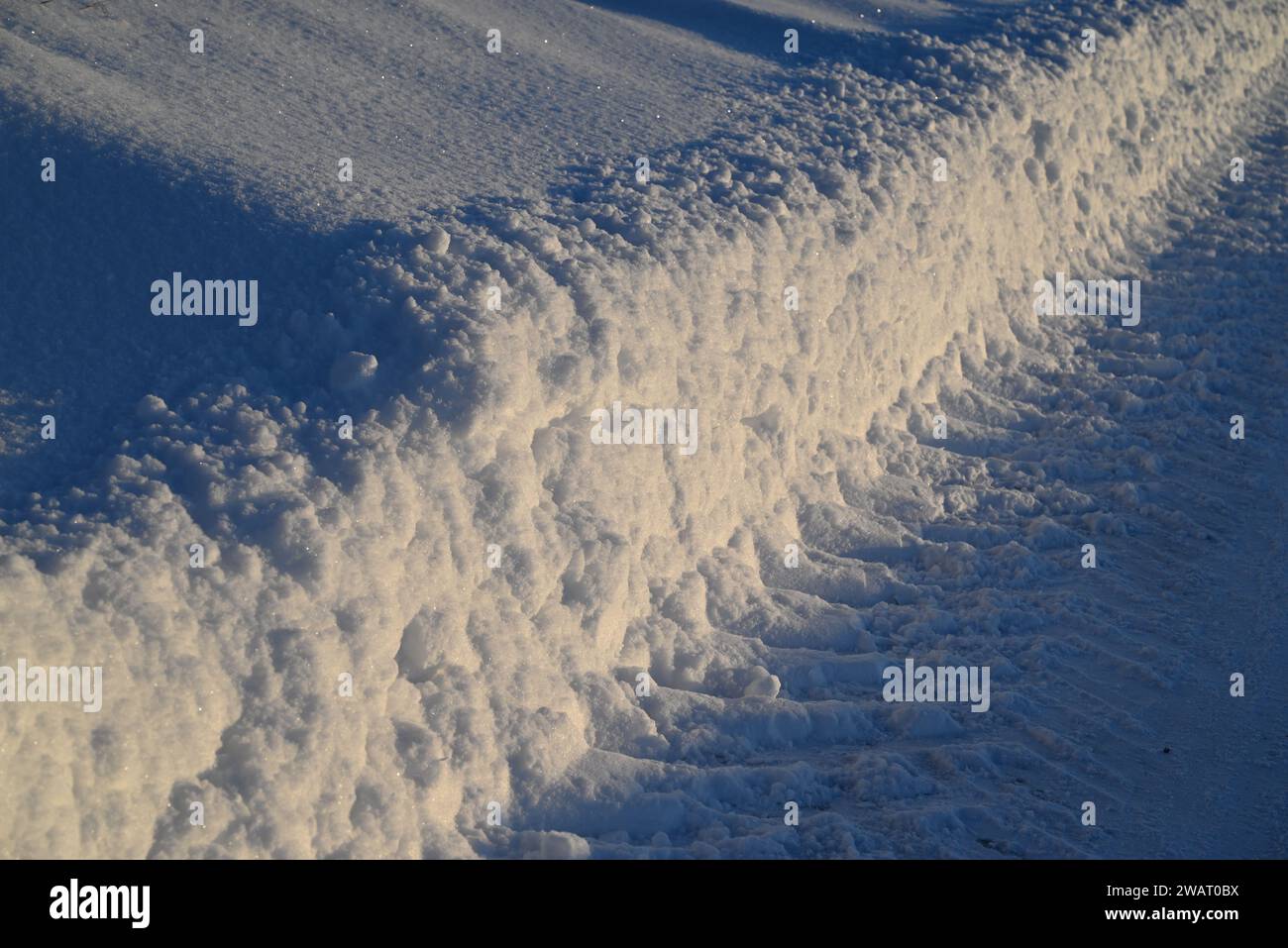 Road dug out in snow. Stock Photo
