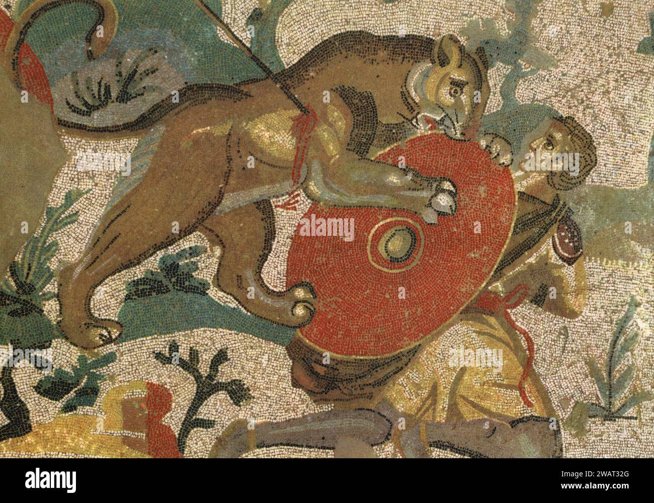 Ancient mosaics hunting scene: Fallen hunter reached by the lioness, Roman Villa del Casale, Piazza Armerina, Sicily, Italy 1960s Stock Photo