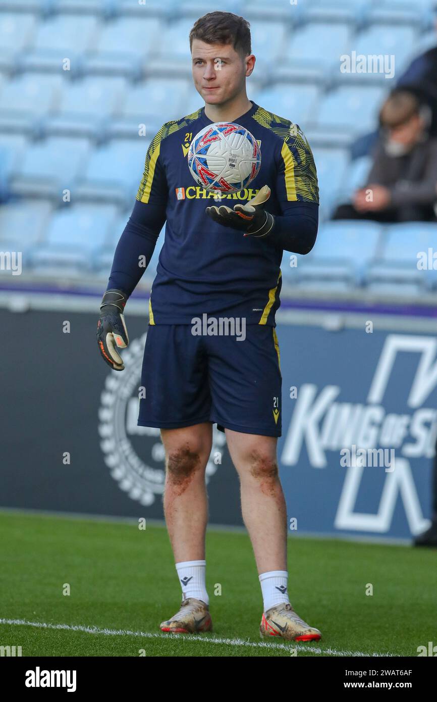 Edward McGinty #21 of Oxford United  warming up during the Emirates FA Cup Third Round match Coventry City vs Oxford United at Coventry Building Society Arena, Coventry, United Kingdom, 6th January 2024  (Photo by Craig Anthony/News Images) Stock Photo