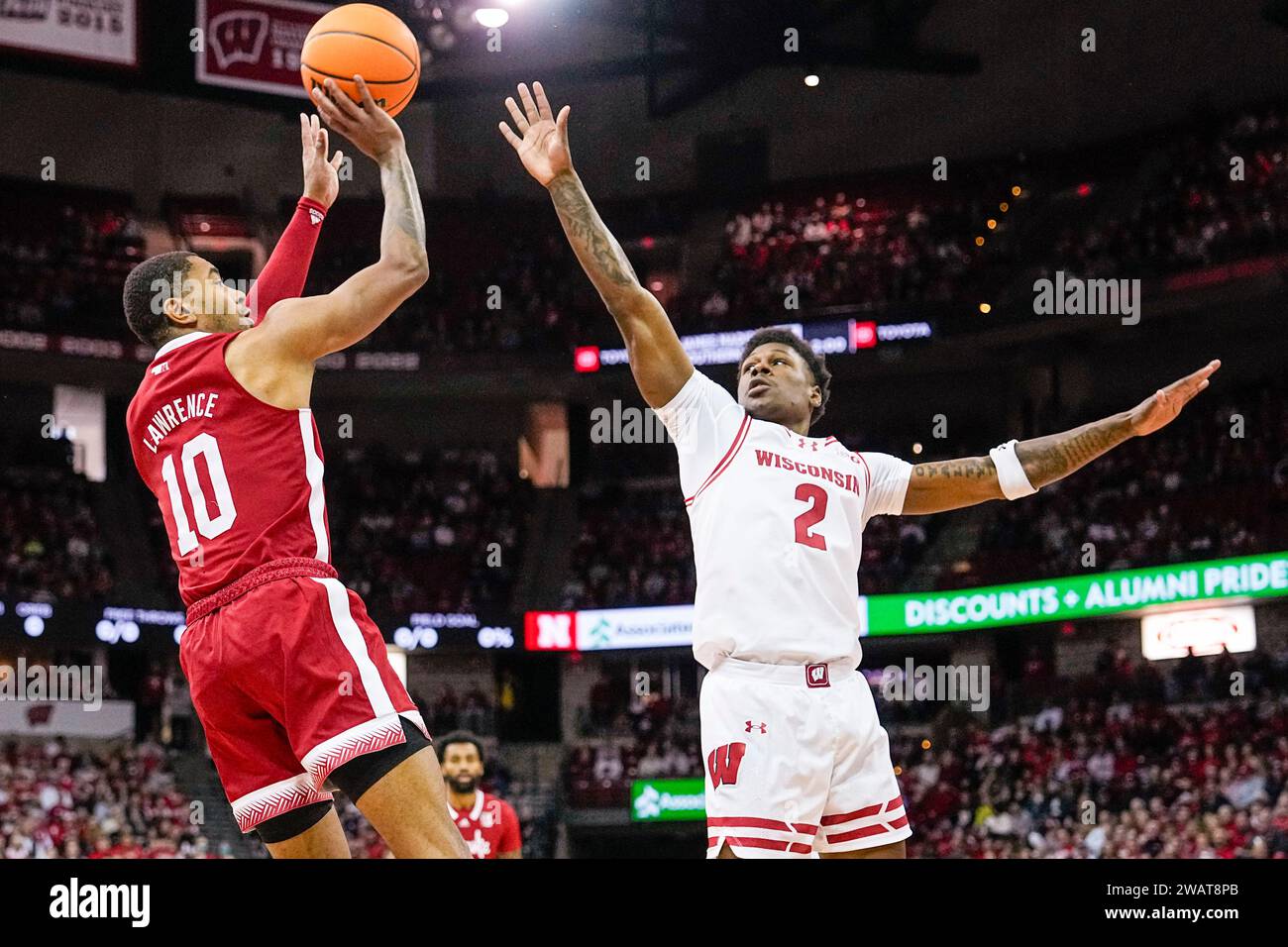 Nebraska's Jamarques Lawrence (10) shoots against Wisconsin's AJ Storr (2) during the first half