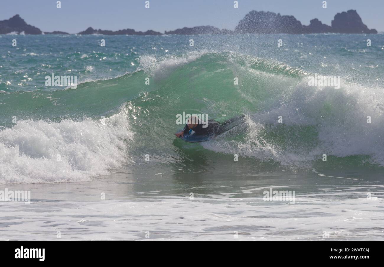 Body boarder catching the breaker at Kynance Cove, Cornwall.  About to wipe out. Stock Photo