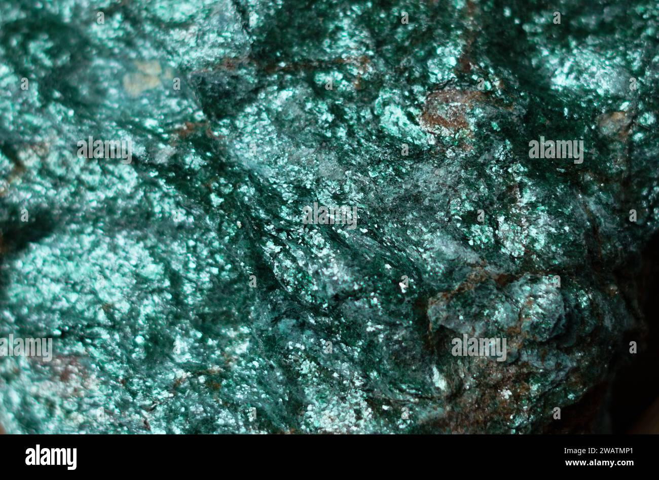 Piece of natural green fuchsite on the white background Stock Photo - Alamy