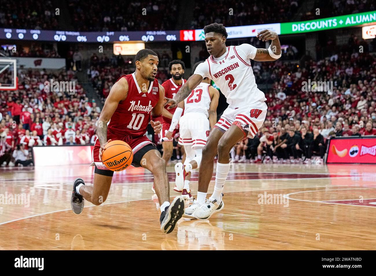 Nebraska's Jamarques Lawrence (10) against Wisconsin's AJ Storr (2) during the first half of an