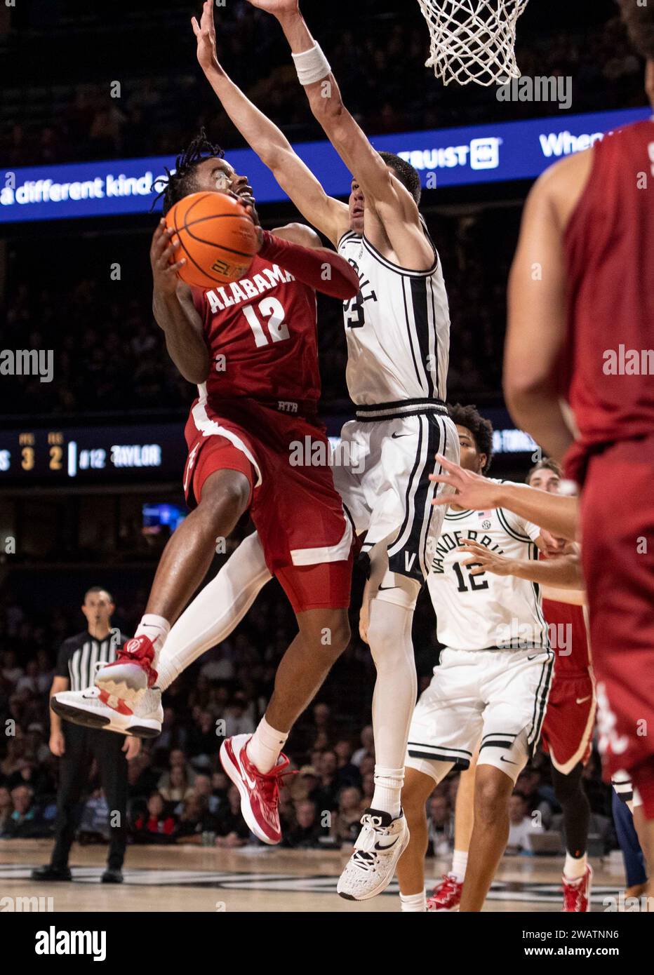 Nashville, Tennessee, USA. 6th Jan, 2024. Alabama Crimson Tide guard Latrell Wrightsell Jr. (12) goes up for the basket during the second half of his NCAA basketball at Vanderbilt University in Nashville. (Credit Image: © Camden Hall/ZUMA Press Wire) EDITORIAL USAGE ONLY! Not for Commercial USAGE! Stock Photo