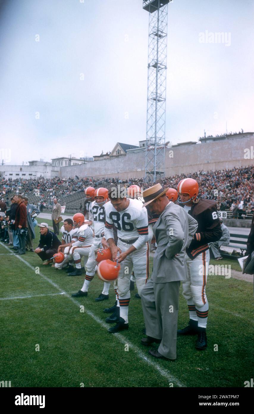 SAN FRANCISCO, CA - AUGUST 19:  Head coach Paul Brown and Dante Lavelli #86 of the San Francisco 49ers stand on the sideline during an NFL game against the Cleveland Browns on August 19, 1956 at Kezar Stadium in San Francisco, California.  (Photo by Hy Peskin) *** Local Caption *** Paul Brown;Dante Lavelli Stock Photo