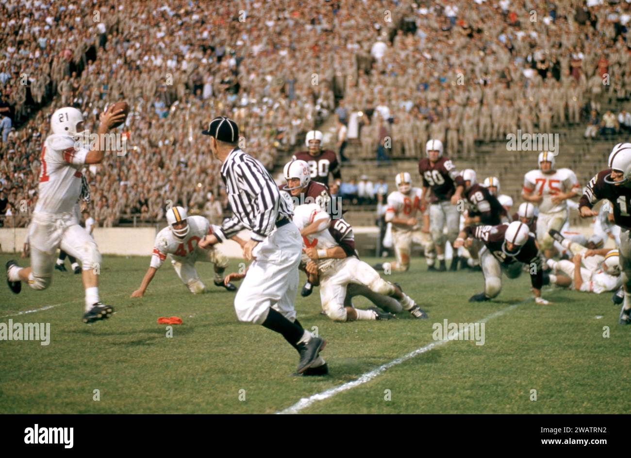 DALLAS, TX - SEPTEMBER 21:  General view of players from the #2 ranked Texas A&M Aggies playing against the Maryland Terrapins on September 21, 1957 at the Cotton Bowl in Dallas, Texas.  The Aggies defetead the Terrapins 21-13.  (Photo by Hy Peskin) Stock Photo