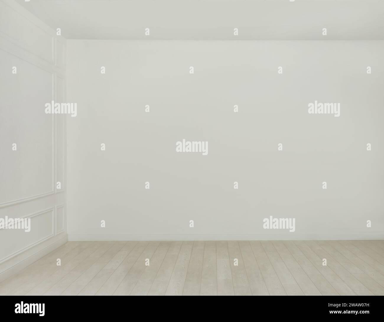 Empty room with white walls and laminated flooring Stock Photo