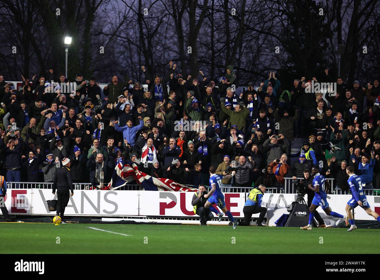 Newport, UK. 06th Jan, 2024. Eastleigh fans celebrate as Chris Maguire