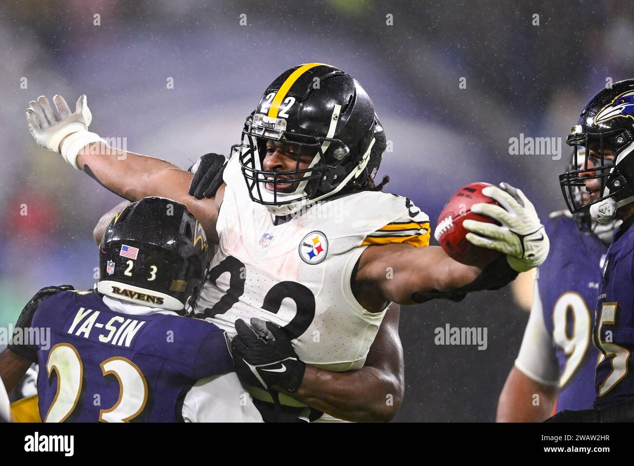 Baltimore, United States. 06th Jan, 2024. Pittsburgh Steelers running back Najee Harris (22) earns a first down as Baltimore Ravens cornerback Rock Ya-Sin (23) stopS him during the second half at M&T Bank Stadium in Baltimore, Maryland, on Saturday, January 6, 2024. Pittsburgh won 17-10. Photo by David Tulis/UPI Credit: UPI/Alamy Live News Stock Photo