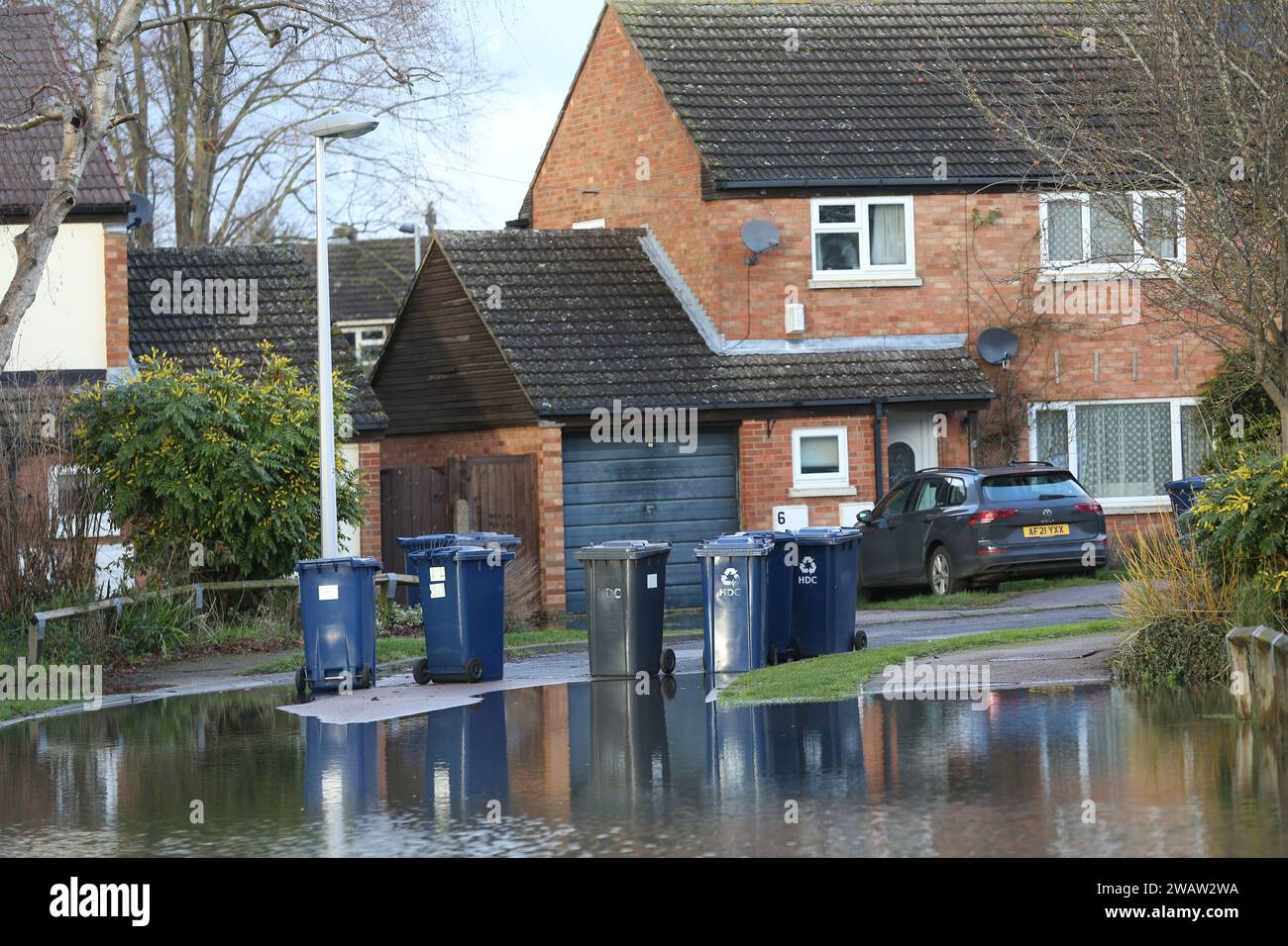 Brampton, UK. 06th Jan, 2024. Residents line up wheelie bins to prevent