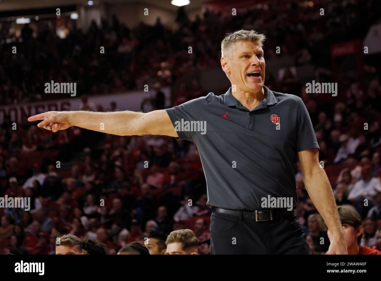 Oklahoma head coach Porter Moser points during the first half of an