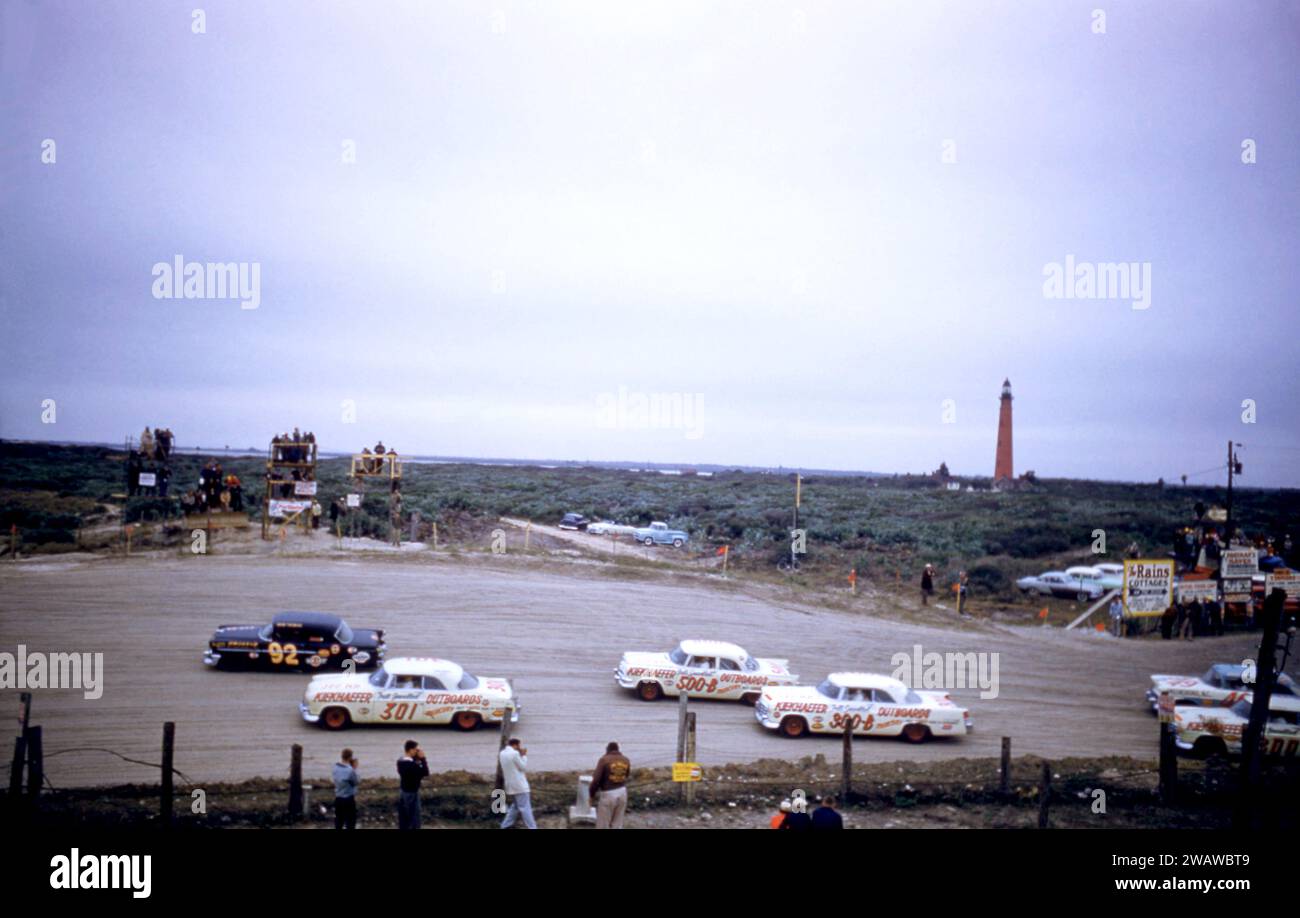 DAYTONA BEACH, FL - FEBRUARY 26: Herb Thomas in the #92 Chevrolet leads Buck Baker in the #301 Chrysler, Fonty Flock in the #500B Dodge and Frank Mundy in the #300B Chrysler during the 1956 NASCAR Daytona Beach and Road Course race on February 26, 1956 in Daytona Beach, Florida. (Photo by Hy Peskin) *** Local Caption *** Herb Thomas;Buck Baker;Fonty Flock;Frank Mundy Stock Photo